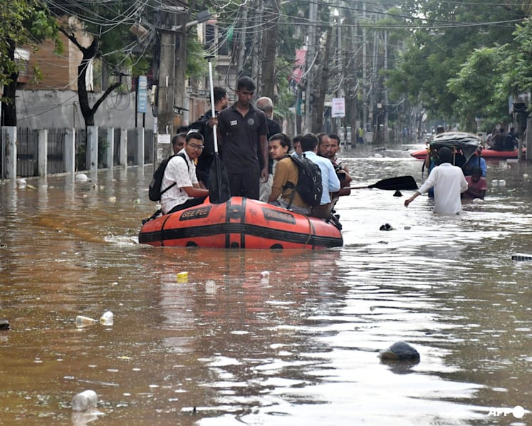 Floods in India's northeast kill nearly 100