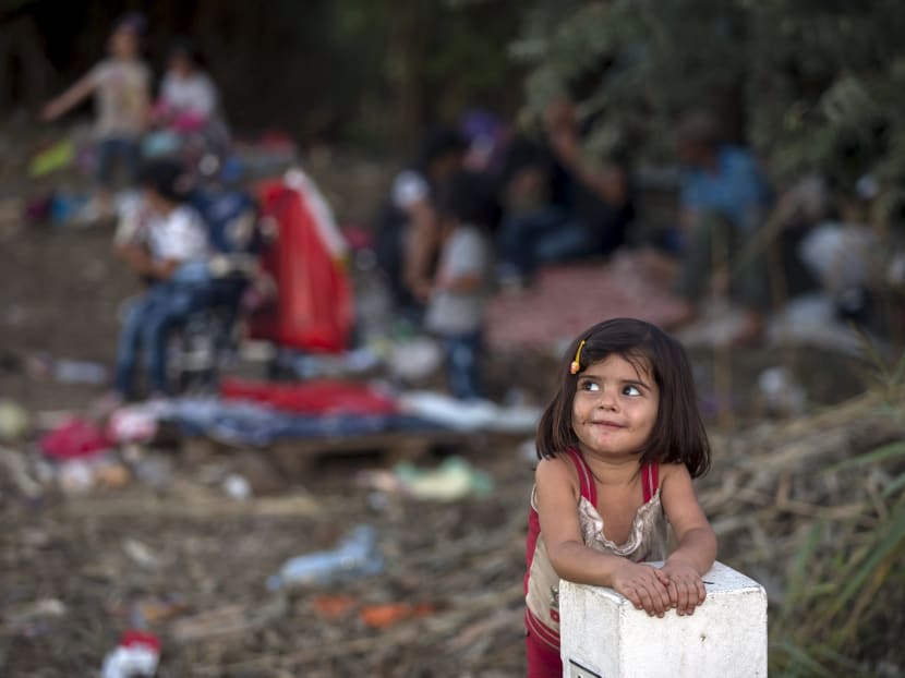 Refugees or migrants? Debate over words to describe crisis