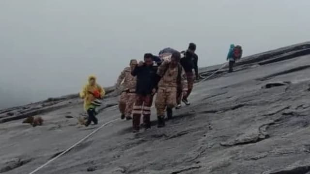 英七旬游客成功登顶沙巴神山  下山却昏倒身亡  