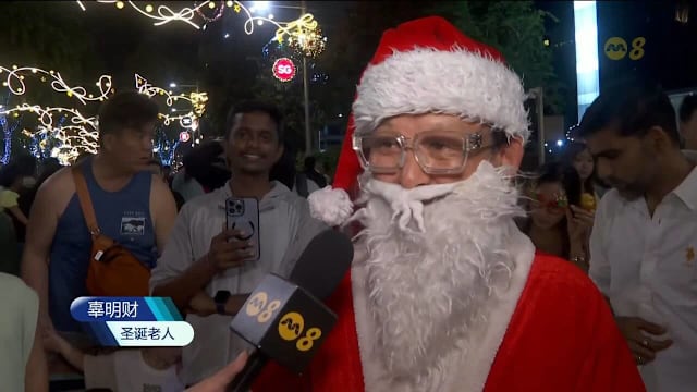 乌节路平安夜派对人潮汹涌 警员站岗巡逻确保安全