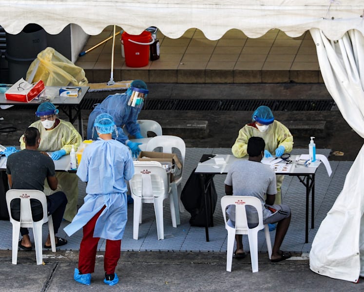 Vaccinated migrant worker among 14 new Covid-19 cases; MOH to monitor re-infection of recovered patients
