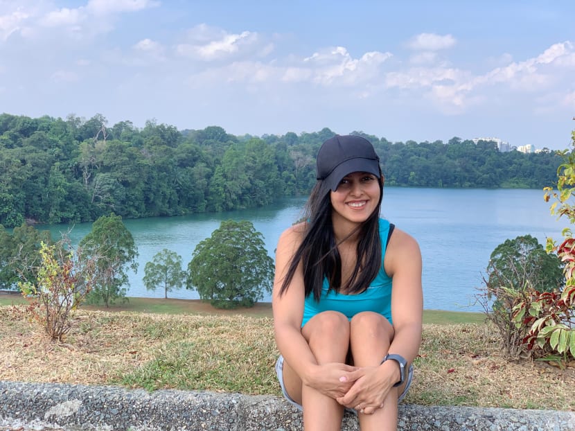 The writer, a Singaporean working in the technology sector, during a cycling trip around Singapore in August 2021. 