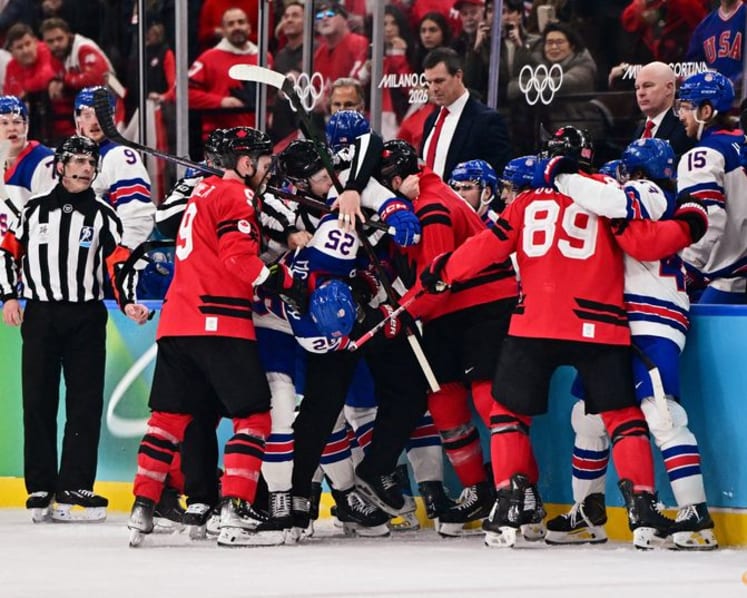 Ice hockey-US claim long-awaited gold by beating rivals Canada in overtime thriller