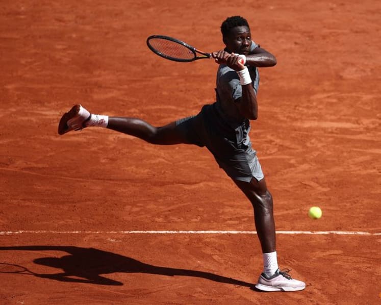 French teen Kouame reaches French Open third round in five-set thriller