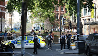 Woman arrested after four men stabbed in central London