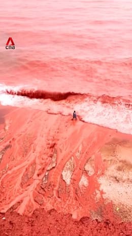Rainstorm turns beach on Iran’s Hormuz Island deep red