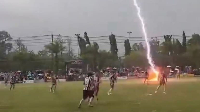 Thai footballer killed in lighting strike during match in Narathiwat province; Malaysian among 12 others injured