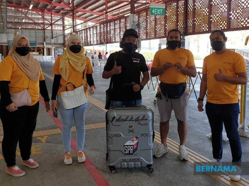 Johor state election: Volunteers deliver final batch of 1,021 postal ballots from Singapore