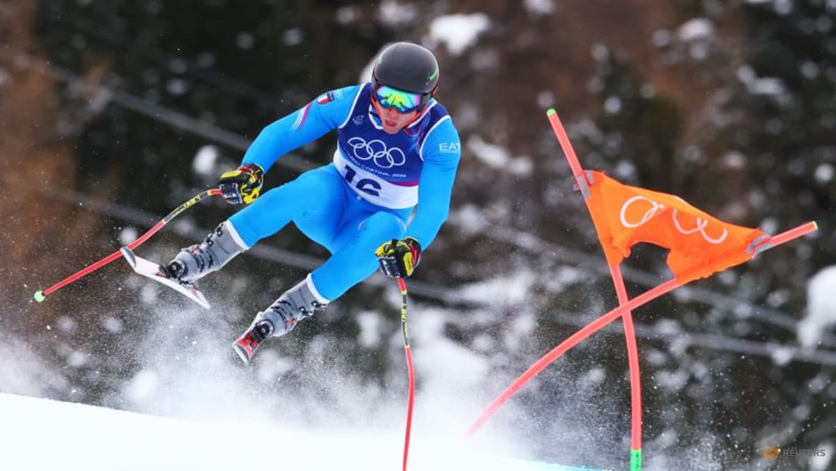 Alpine skiing-Italian trio set pace in sun-kissed downhill training