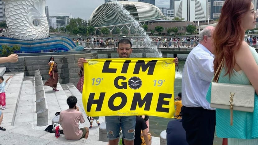 Stern warning for Spanish couple under Singapore police probe for protest against Valencia owner Peter Lim