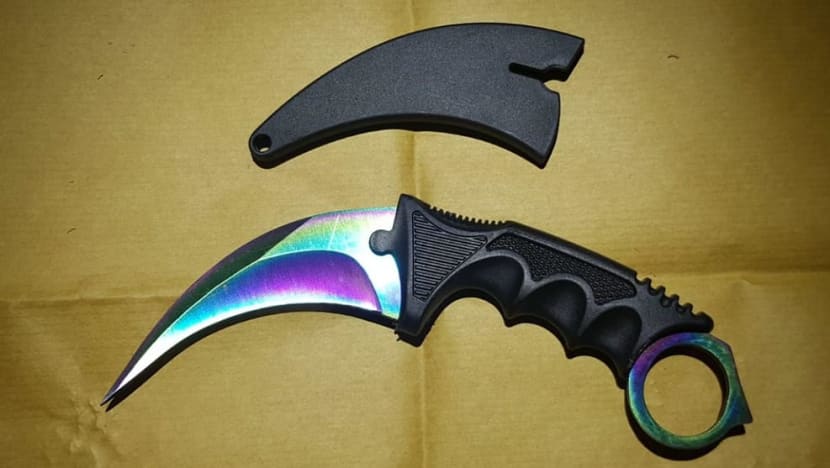 7 arrested for allegedly rioting while armed with karambit knife