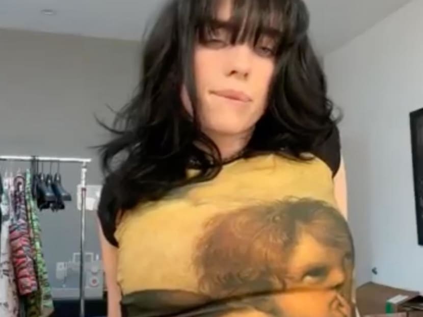 Billie Eilish gives fans peek of huge dragon tattoo after vowing they would ‘never’ see her body art