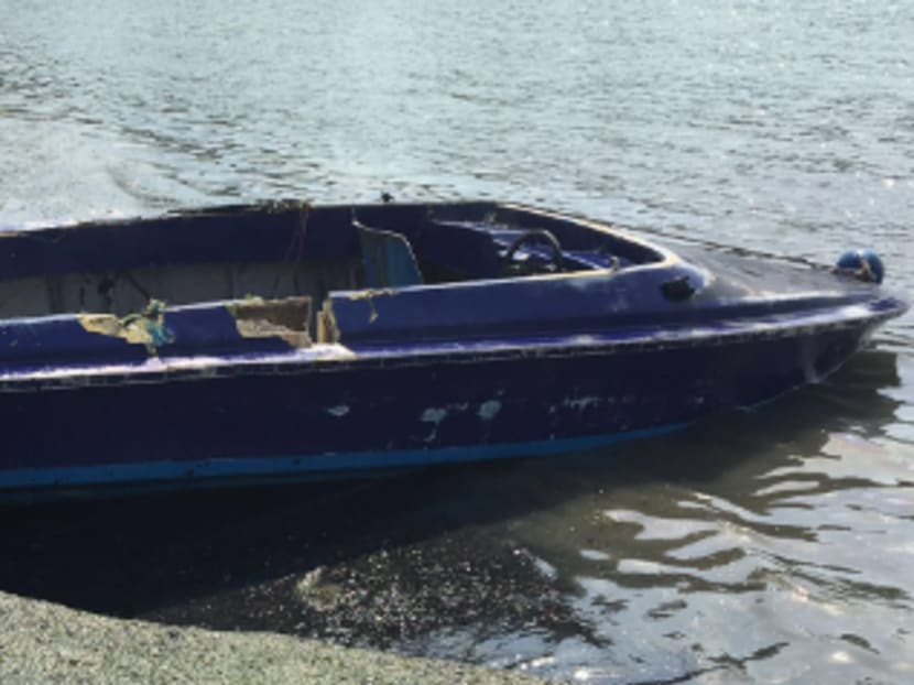 Speedboat suspected to be used for smuggling of illegal immigrants and duty unpaid cigarettes. Photo: Police Speedboat suspected to be used for smuggling of illegal immigrants and duty unpaid cigarettes. Photo: Police