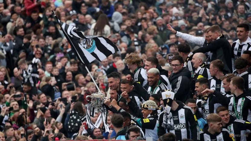 Newcastle celebrate end of 70-year trophy drought in sea of black and white