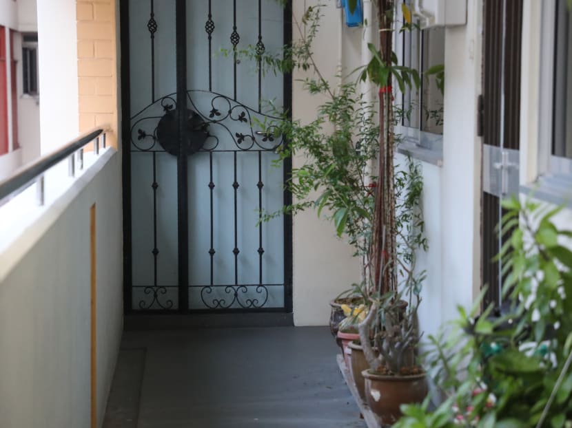 A view of the flat in a housing block on Bishan Street 23 where a 49-year-old domestic worker allegedly murdered a 73-year-old man.