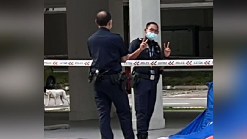 Police officer to face internal action after posing for onlookers at scene of unnatural death