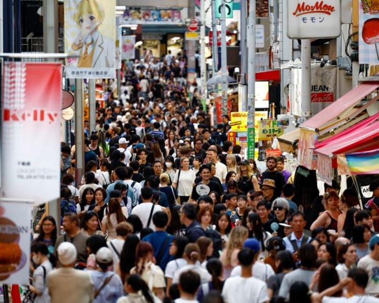 Japan proposes record budget spending while curbing fresh debt