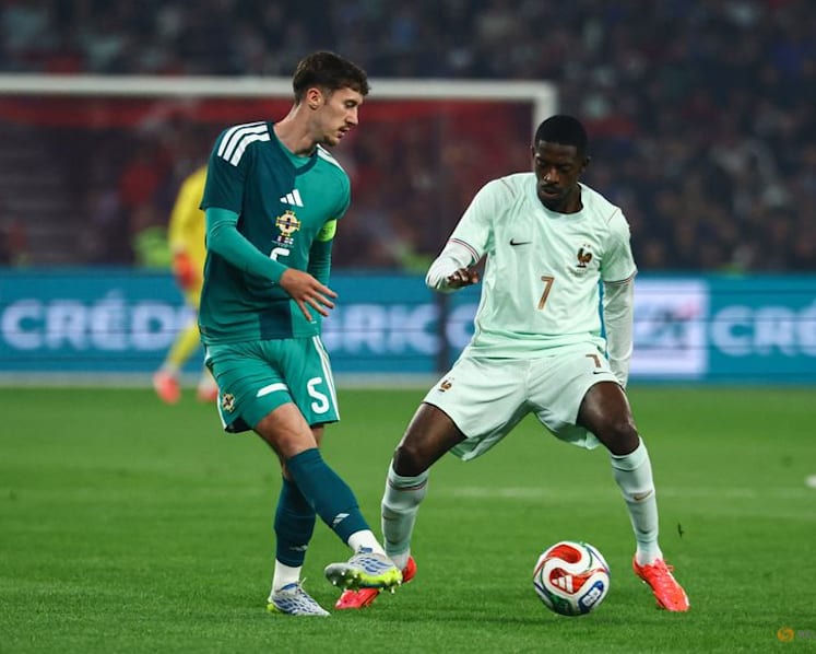 Olise stakes World Cup claim with hat-trick in France win