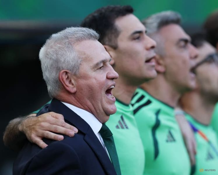 Aguirre downplays milestone after Mexico top World Cup group for first time since 2002