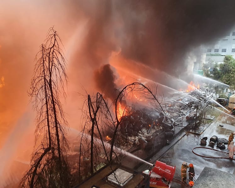 130 firefighters brave intense heat, explosions, to put out fire the size of a football field in Tuas