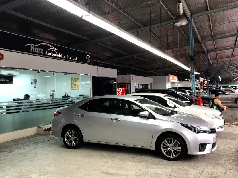 Karz Automobile was in operation at its new premises when TODAY visited on Friday, contrary to an alert by the consumer watchdog that it had shut down.
