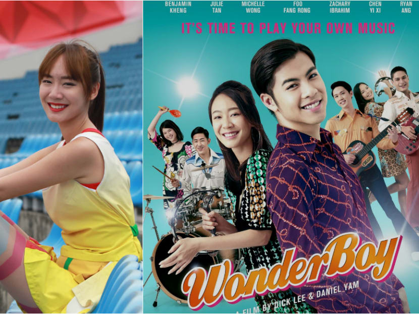 Julie Tan, as seen in her get-up as host of this year's NDP (left), and on the movie poster for Dick Lee's Wonder Boy. Julie Tan, as seen in her get-up as host of this year's NDP (left), and on the movie poster for Dick Lee's Wonder Boy.