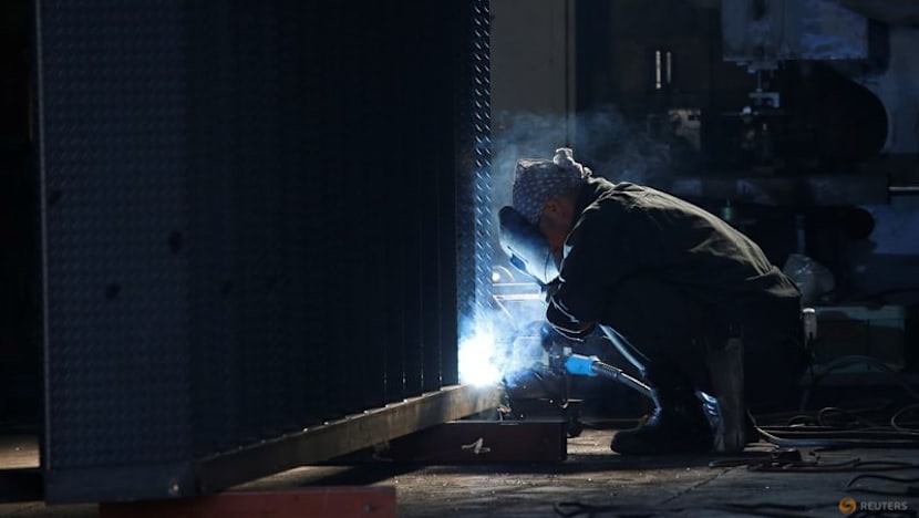 Japan's factory output surges to near 12-year high in July, PMI shows