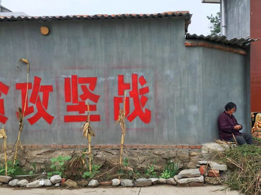 Commentary: A hundred years of revolution, China still can’t take its eyes off poverty 