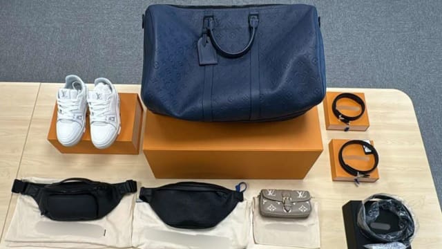 涉嫌盗用信用卡在本地购买奢侈品 两名台湾男子被捕 