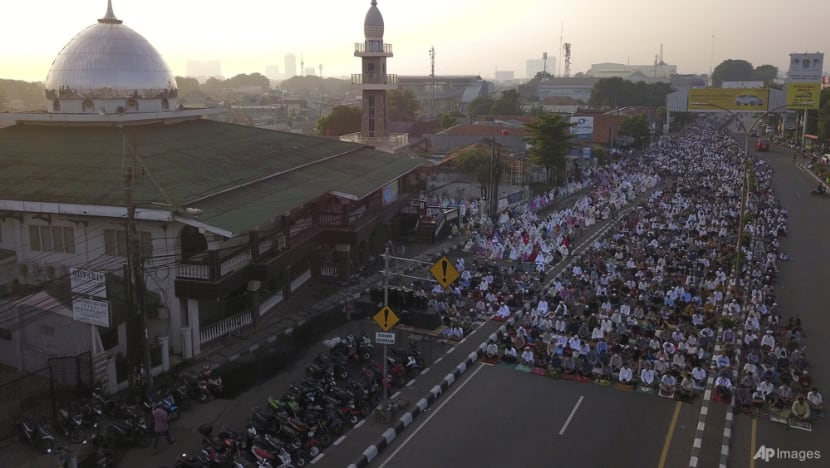 Muslims mark Eid al-Fitr holiday with joy, worry Muslims mark Eid al-Fitr holiday with joy, worry