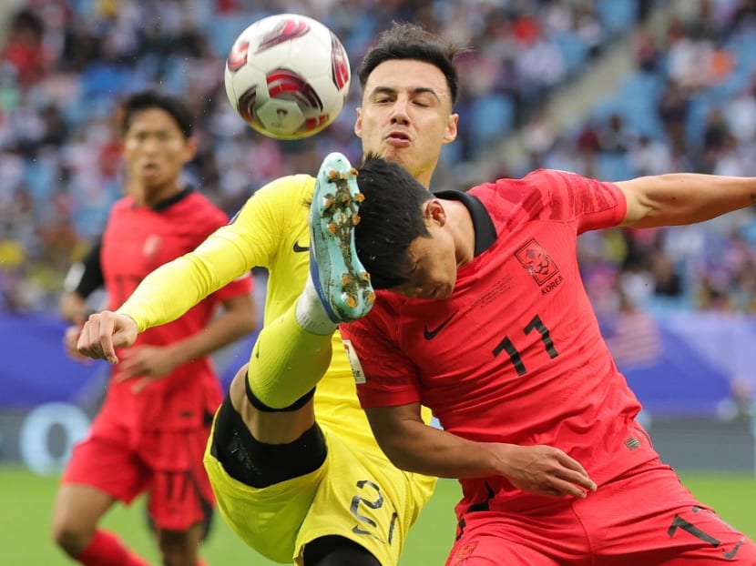 Malaysia’s defender Dion Cools fights for the ball with South Korea’s midfielder Hwang Hee-chan during the Qatar 2023 AFC Asian Cup Group E football match between South Korea and Malaysia at Al-Janoub Stadium in al-Wakrah, south of Doha, on January 25, 2024.