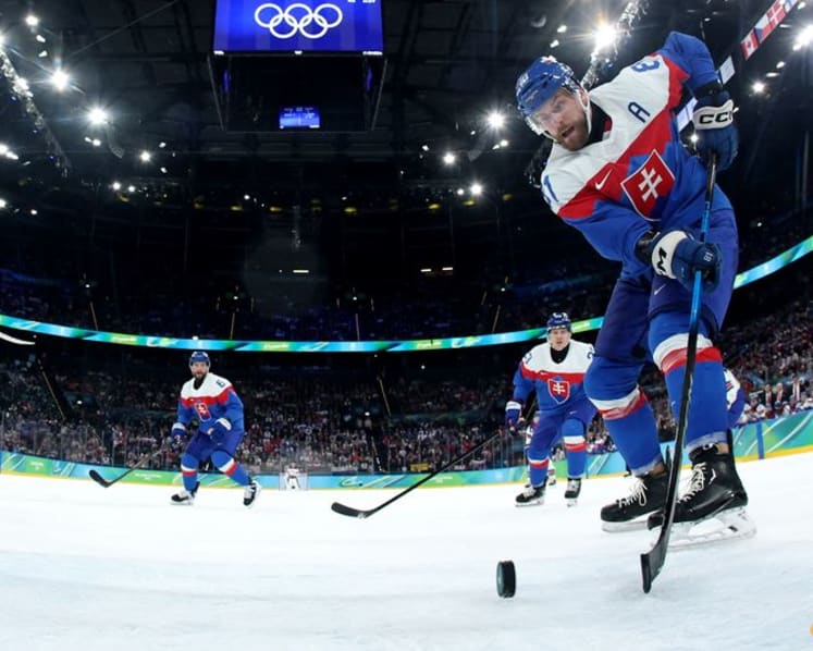 Ice hockey-US rout Slovakia to set up final showdown with Canada