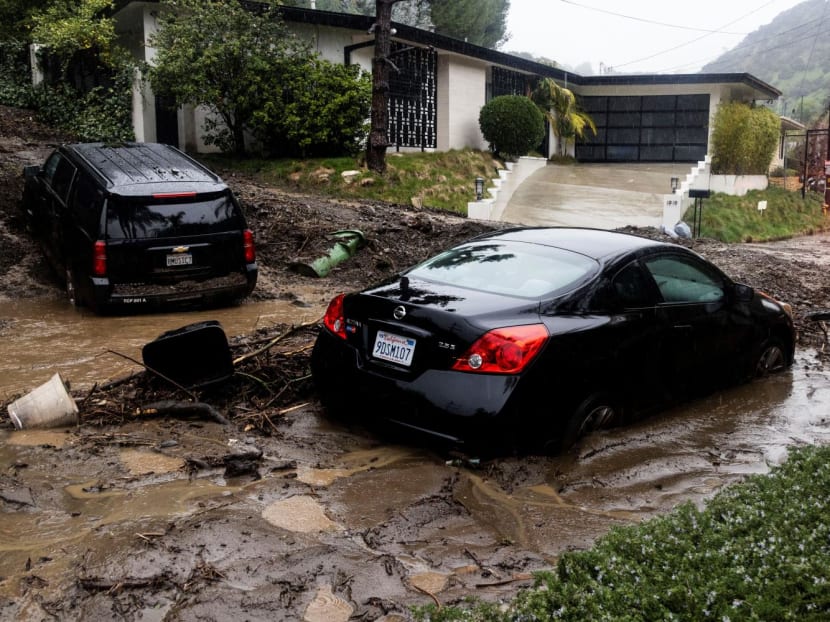 Rain falls over cars stuck by a mudslide, caused by an ongoing rain storm in Studio City, California, US, Feb 5, 2024. Rain falls over cars stuck by a mudslide, caused by an ongoing rain storm in Studio City, California, US, Feb 5, 2024.