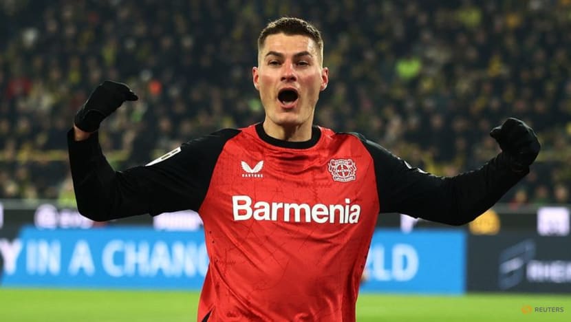 Leverkusen grab last-gasp 4-3 win at Stuttgart to keep title race alive