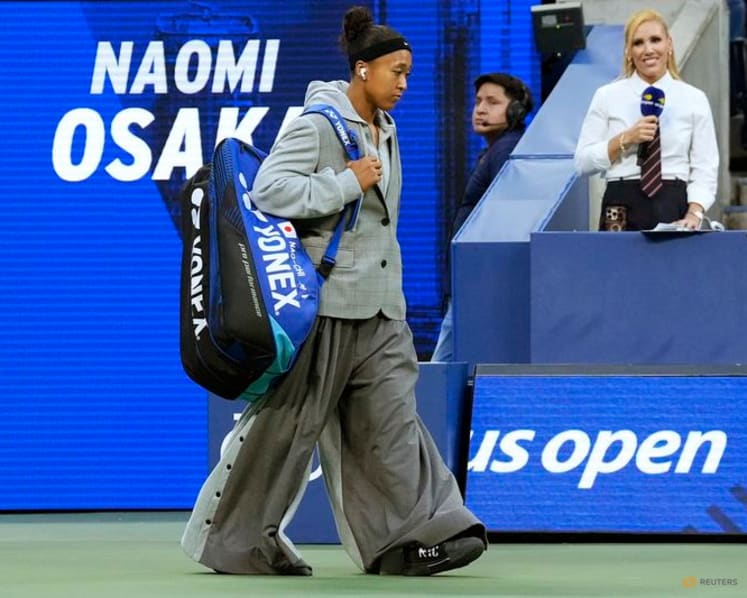 From boardroom chic to battling win, Osaka reaches US Open last 16
