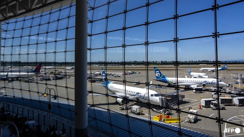 China tells travellers to use caution after 'malicious' US border checks