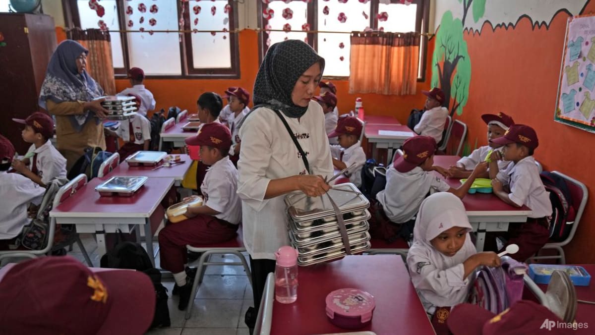 Hundreds sick in Indonesia after free school meals Hundreds sick in Indonesia after free school meals