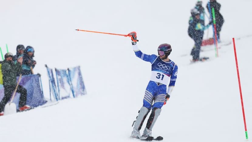 Alpine skiing-Greek Ginnis says bittersweet goodbye with gentle slide down slalom course