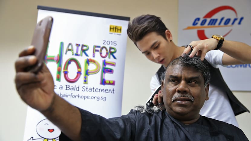 61 cabbies go bald in support for Hair for Hope
