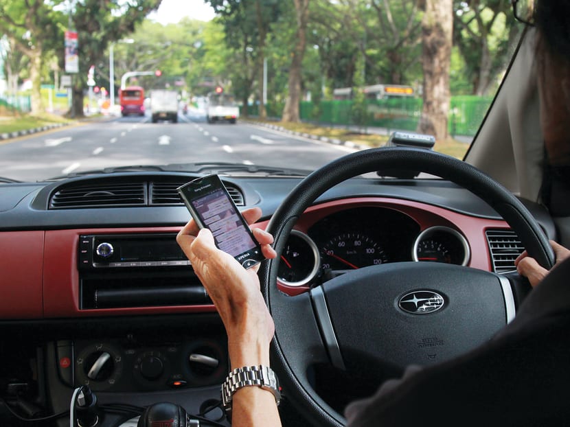 In proposed changes to the Road Traffic Act, motorists who hold and operate mobile devices will be committing an offence. Today File Photo