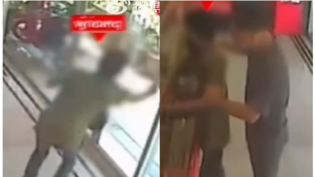 泰男抢金店撒腿就跑 打不开门秒回头还金饰