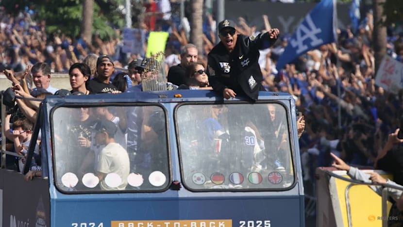 Baseball-Ohtani teases 'three-peat' as Dodgers parade draws Los Angeles crowds
