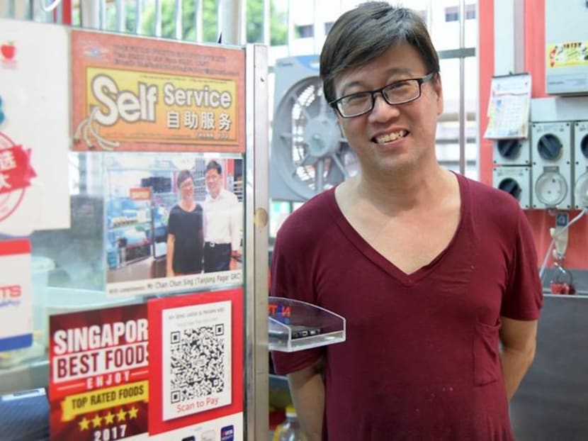 Going cashless at hawker centres: Challenges and opportunities Going cashless at hawker centres: Challenges and opportunities