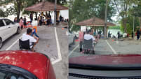 Man Sits In Parking Lot To Reserve The Space, Has A Picnic While He’s At It
