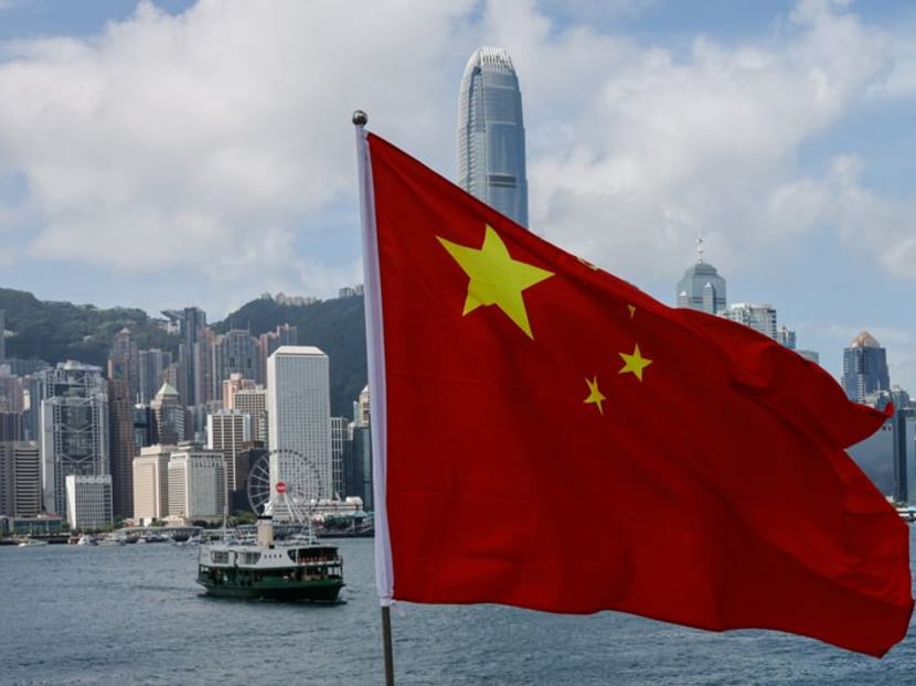 The Chinese national flag is seen in front of the financial district on the Chinese National Day in Hong Kong, China on Oct 1, 2022. The Chinese national flag is seen in front of the financial district on the Chinese National Day in Hong Kong, China on Oct 1, 2022.