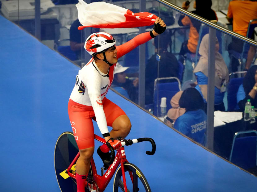 Calvin Sim celebrating after his cycle. Photo: Jason Quah/TODAY