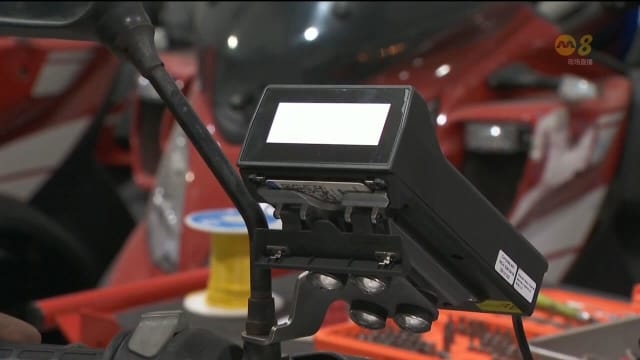 配合新一代无闸门公路电子收费系统 近2万辆车已安装智能行车器