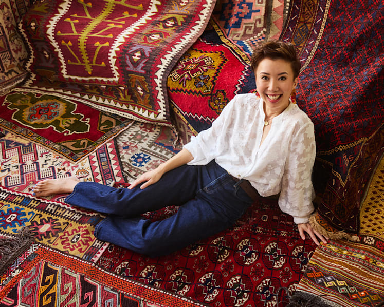 This passionate collector of vintage tribal rugs uses them to style her home in Singapore