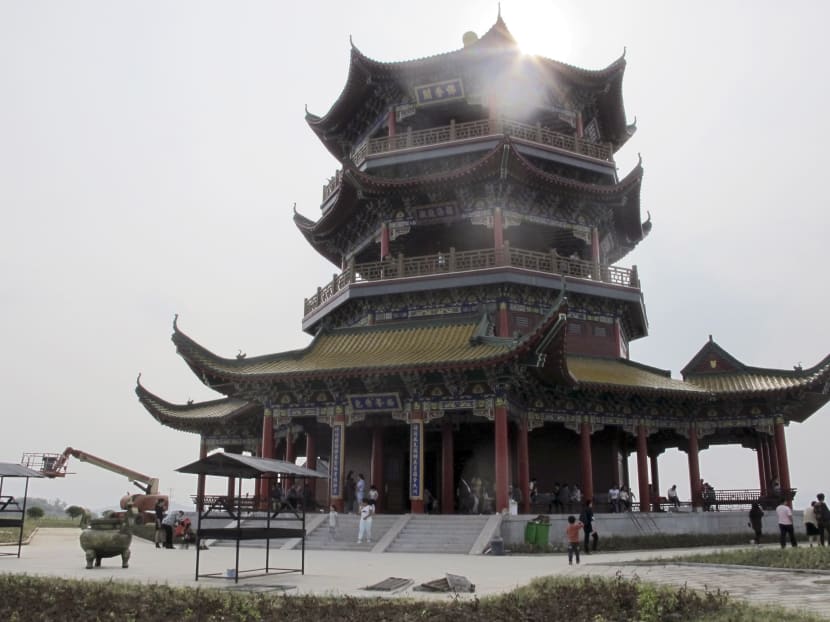 Replica of razed Chinese palace opens, but some prefer ruins