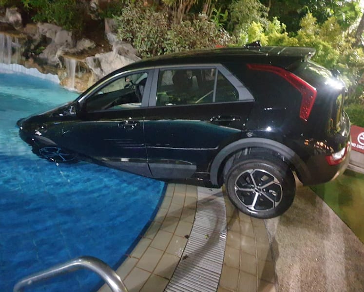 Man who drove into Seletar Country Club swimming pool while intoxicated pleads guilty